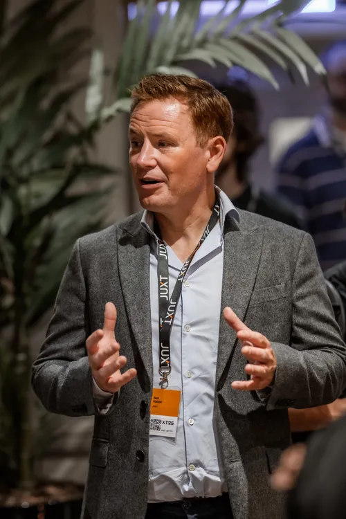 A headshot of Ben Halton